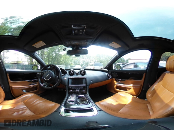 2014 Jaguar XJ with VIN SAJWA2EK8EMV67443, listed as a IAAI auction lot 42483075 with 88,357 mi miles and . Bid and sale history available at DreamBid. Image 18.