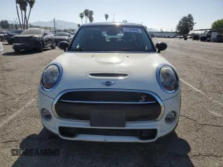 2017 MINI Hardtop 4 Door Cooper S z VIN WMWXU3C53H2D32509, wystawiony jako Copart lot #57886695 z przebiegiem 115 433 mil mil oraz Tytuł czysty. Historia ofert i sprzedaży dostępna na DreamBid. Obrazek 5.