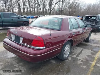 2005 Ford Crown Victoria LX with VIN 2FAFP74W25X106106, listed as a IAAI auction lot 41825793 with 175,740 mi miles. Bid and sale history available at carsss.com. Image 4.