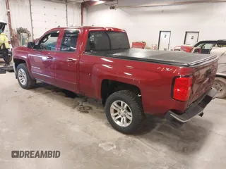 2018 Chevrolet Silverado 1500 LT with VIN 1GCVKREC3JZ190574, listed as a IAAI auction lot 41897346 with 144,927 mi miles and . Bid and sale history available at DreamBid. Image 3.