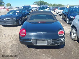 2002 Ford Thunderbird w/Hardtop Premium with VIN 1FAHP60AX2Y116200, listed as a IAAI auction lot 40129557 with 88,991 mi miles. Bid and sale history available at carsss.com. Image 16.