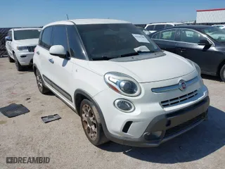 2014 FIAT 500L Trekking with VIN ZFBCFADH2EZ007586, listed as a IAAI auction lot 42040589 with 69,793 mi miles. Bid and sale history available at carsss.com. Image 1.