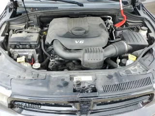 2015 Dodge Durango Limited with VIN 1C4RDJDG0FC904897, listed as a Copart auction lot 58985025 with 147,139 mi miles and Salvage title. Bid and sale history available at DreamBid. Image 12.