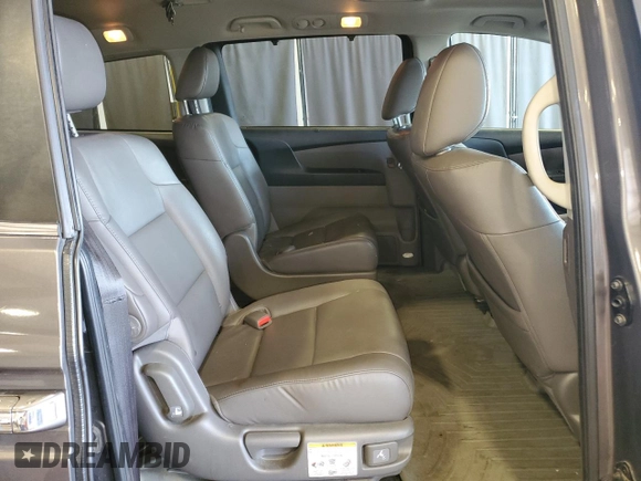 2014 Honda Odyssey EX-L with VIN 5FNRL5H6XEB134849, listed as a Copart auction lot 63617435 with 127,491 mi miles and Salvage title. Bid and sale history available at DreamBid. Image 11.