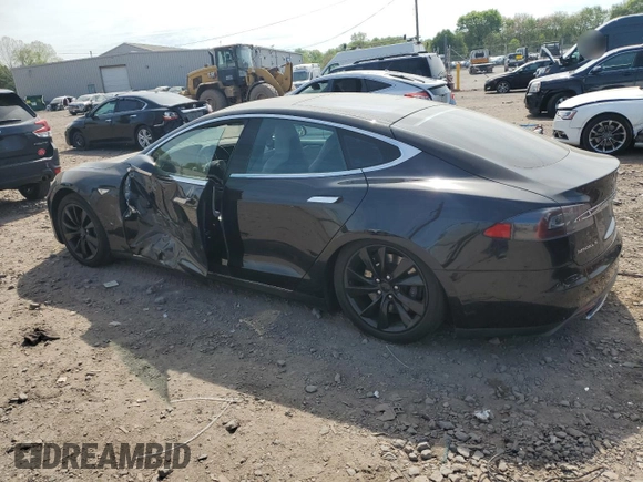 2016 Tesla Model S 90D with VIN 5YJSA1E28GF131212, listed as a Copart auction lot 54176705 with 97,373 mi miles and Salvage Title. Bid and sale history available at DreamBid. Image 2.