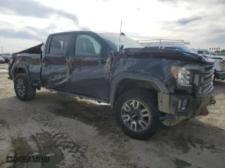 2021 GMC Sierra 2500HD AT4 with VIN 1GT49PEY0MF193638, listed as a Copart auction lot 48352925 with 140,995 mi miles and Salvage Title. Bid and sale history available at carsss.com. Image 4.