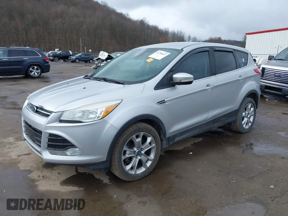 2013 Ford Escape SEL with VIN 1FMCU9H93DUA81448, listed as a IAAI auction lot 41790631 with 176,015 mi miles. Bid and sale history available at carsss.com. Image 2.