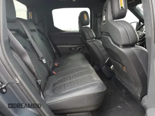 2023 Rivian R1T Adventure with VIN 7FCTGAAA3PN000801, listed as a Copart auction lot 51600895 with 19,486 mi miles and Salvage Title. Bid and sale history available at carsss.com. Image 11.