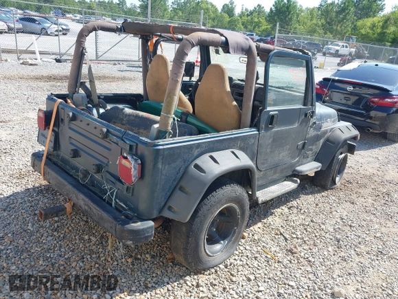 1998 Jeep Wrangler Sport with VIN 1J4FY19S2WP710055, listed as a IAAI auction lot 42680216 with Not provided miles and . Bid and sale history available at DreamBid. Image 4.