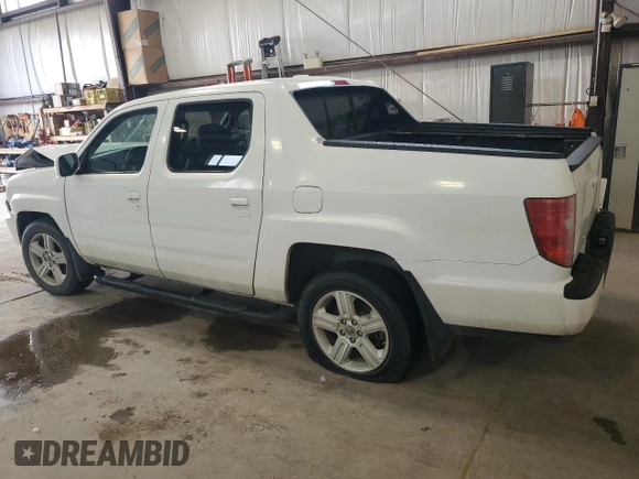 2012 Honda Ridgeline RTL with VIN 5FPYK1F59CB501178, listed as a Copart auction lot 60634535 with 165,766 mi miles and Salvage title. Bid and sale history available at DreamBid. Image 2.