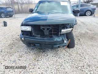 2003 Chevrolet Blazer LS z VIN 1GNDT13X93K177170, wystawiony jako IAAI lot #41839837 z przebiegiem 148 555 mil mil oraz . Historia ofert i sprzedaży dostępna na DreamBid. Obrazek 6.