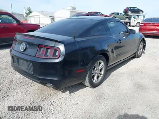 2013 Ford Mustang V6 with VIN 1ZVBP8AM7D5203672, listed as a IAAI auction lot 42104121 with 215,815 mi miles. Bid and sale history available at carsss.com. Image 4.