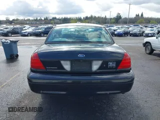 2001 Ford Crown Victoria Police Police Interceptor with VIN 2FAFP71W81X147404, listed as a IAAI auction lot 41932255 with 108,921 mi miles. Bid and sale history available at carsss.com. Image 16.