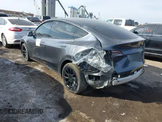 2022 Tesla Model Y Long Range z VIN 7SAYGDEE6NA013757, wystawiony jako IAAI lot #41364867 z przebiegiem 33 621 mil mil oraz . Historia ofert i sprzedaży dostępna na DreamBid. Obrazek 3.