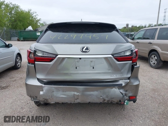 2022 Lexus RX 350 with VIN 2T2AZMDA7NC352957, listed as a IAAI auction lot 42297457 with 34,576 mi miles and . Bid and sale history available at DreamBid. Image 16.