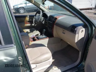 2004 Kia Sorento LX with VIN KNDJC733045304206, listed as a IAAI auction lot 41899253 with 134,711 mi miles. Bid and sale history available at carsss.com. Image 5.