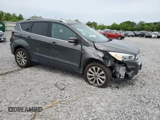2018 Ford Escape Titanium with VIN 1FMCU9J97JUB34691, listed as a Copart auction lot 56404625 with 107,037 mi miles and Salvage title. Bid and sale history available at DreamBid. Image 4.