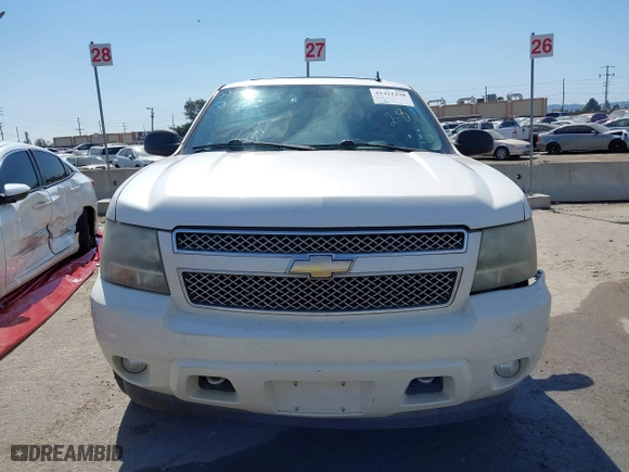 2008 Chevrolet Suburban LTZ with VIN 1GNFC16058R198040, listed as a IAAI auction lot 41421238 with 215,591 mi miles. Bid and sale history available at carsss.com. Image 12.