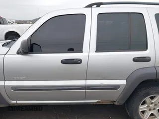 2004 Jeep Liberty Sport with VIN 1J4GL48K74W318861, listed as a IAAI auction lot 41706222 with 211,089 mi miles. Bid and sale history available at carsss.com. Image 14.