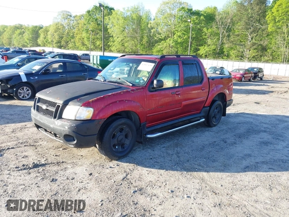2004 Ford Explorer Sport Trac XLS z VIN 1FMZU67K64UC21974, wystawiony jako IAAI lot #42017439 z przebiegiem 193 613 mil mil oraz . Historia ofert i sprzedaży dostępna na DreamBid. Obrazek 2.