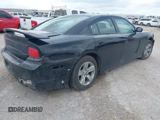 2013 Dodge Charger SE with VIN 2C3CDXBG2DH526480, listed as a IAAI auction lot 42025293 with 147,385 mi miles. Bid and sale history available at carsss.com. Image 4.
