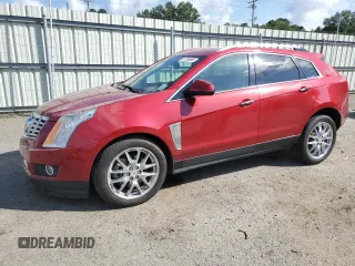 2014 Cadillac SRX Performance Collection with VIN 3GYFNCE33ES589121, listed as a Copart auction lot 61755885 with 90,657 mi miles and Salvage title. Bid and sale history available at DreamBid. Image 1.