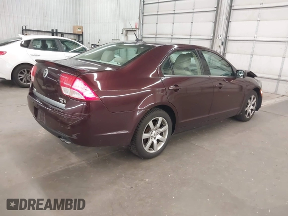 2011 Mercury Milan with VIN 3MEHM0HA3BR602364, listed as a IAAI auction lot 42471282 with 129,344 mi miles and . Bid and sale history available at DreamBid. Image 4.
