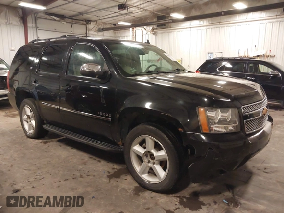 2012 Chevrolet Tahoe LTZ with VIN 1GNSKCE02CR297261, listed as a IAAI auction lot 40255137 with 283,110 mi miles and . Bid and sale history available at DreamBid. Image 14.