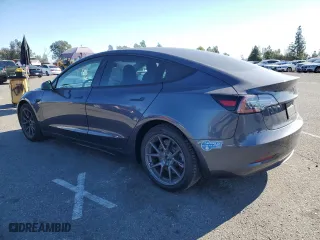2021 Tesla Model 3 Standard Range Plus with VIN 5YJ3E1EA9MF872920, listed as a Copart auction lot 83625474 with 62,507 mi miles and Salvage Title. Bid and sale history available at carsss.com. Image 2.