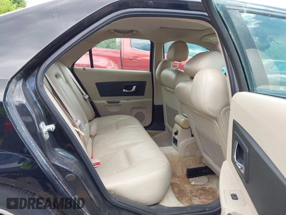 2004 Cadillac CTS z VIN 1G6DM577X40125926, wystawiony jako IAAI lot #42363599 z przebiegiem 187 600 mil mil oraz . Historia ofert i sprzedaży dostępna na DreamBid. Obrazek 8.
