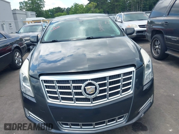 2013 Cadillac XTS Luxury с VIN 2G61P5S34D9183910, выставлен на аукционе IAAI как лот 42479531 с пробегом 160 798 миль миль и . История ставок и продаж доступна на DreamBid. Изображение 12.