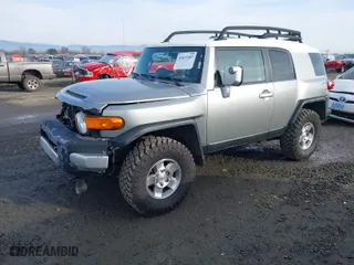 2010 Toyota FJ Cruiser with VIN JTEBU4BF6AK096501, listed as a IAAI auction lot 41413287 with 236,788 mi miles. Bid and sale history available at carsss.com. Image 2.