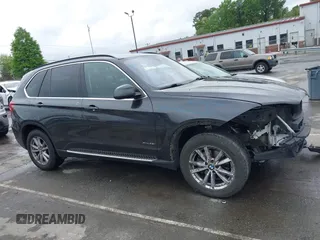 2015 BMW X5 xDrive35i z VIN 5UXKR0C59F0K55226, wystawiony jako IAAI lot #41952931 z przebiegiem 156 655 mil mil oraz . Historia ofert i sprzedaży dostępna na DreamBid. Obrazek 13.