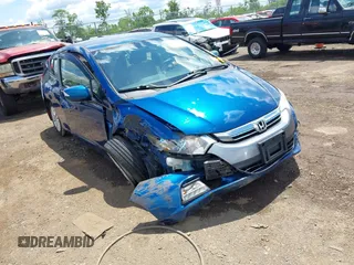 2013 Honda Insight EX z VIN JHMZE2H75DS001093, wystawiony jako IAAI lot #42346816 z przebiegiem 153 488 mil mil oraz . Historia ofert i sprzedaży dostępna na DreamBid. Obrazek 1.