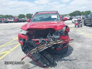 2016 Toyota Tacoma SR5 with VIN 5TFAX5GNXGX054633, listed as a IAAI auction lot 42088863 with 105,184 mi miles and . Bid and sale history available at DreamBid. Image 12.