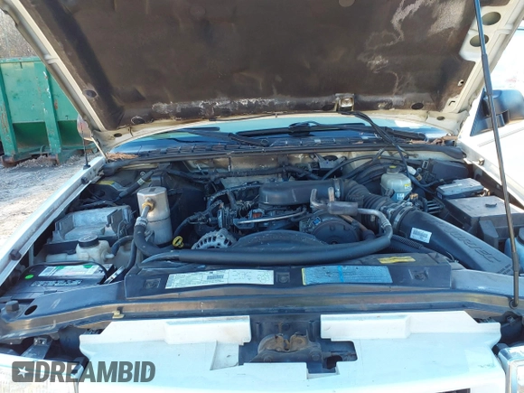 2002 Chevrolet Blazer LS z VIN 1GNDT13W32K146843, wystawiony jako IAAI lot #41497892 z przebiegiem 121 882 mil mil oraz . Historia ofert i sprzedaży dostępna na DreamBid. Obrazek 10.
