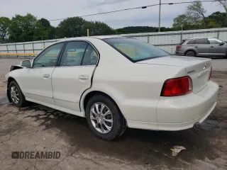 2002 Mitsubishi Galant ES z VIN 4A3AA46G12E124150, wystawiony jako Copart lot #60691994 z przebiegiem 113 597 mil mil oraz Szkoda całkowita • Salvage title. Historia ofert i sprzedaży dostępna na DreamBid. Obrazek 2.
