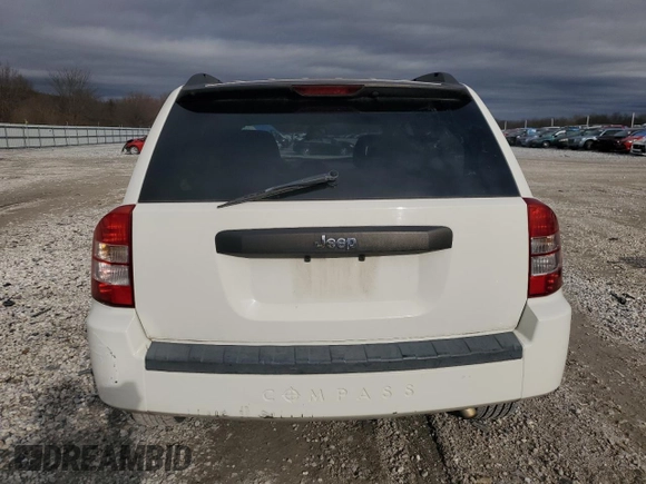 2009 Jeep Compass North with VIN 1J4FT47B49D196637, listed as a Copart auction lot 82918314 with 156,117 mi miles and Clean Title. Bid and sale history available at carsss.com. Image 6.