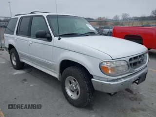 1998 Ford Explorer XL z VIN 1FMZU34E0WZB12557, wystawiony jako IAAI lot #41474546 z przebiegiem 119 294 mil mil oraz . Historia ofert i sprzedaży dostępna na DreamBid. Obrazek 1.