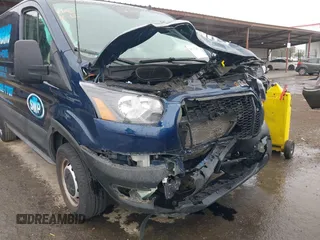 2021 Ford Transit Cargo with VIN 1FTBR1Y80MKA12125, listed as a IAAI auction lot 41773493 with 42,989 mi miles and . Bid and sale history available at DreamBid. Image 6.