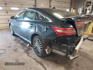 2016 Toyota Avalon Limited with VIN 4T1BK1EB3GU236479, listed as a IAAI auction lot 41370835 with 404,864 mi miles and . Bid and sale history available at carsss.com. Image 3.