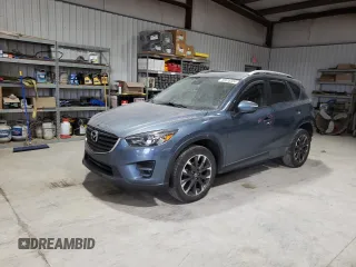 2016 Mazda CX-5 Grand Touring with VIN JM3KE4DY1G0714674, listed as a Copart auction lot 75516524 with 115,766 mi miles and Salvage Title. Bid and sale history available at carsss.com. Image 1.