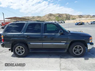 2005 GMC Yukon SLT z VIN 1GKEC13T25J178152, wystawiony jako IAAI lot #41685936 z przebiegiem 226 765 mil mil oraz . Historia ofert i sprzedaży dostępna na DreamBid. Obrazek 13.