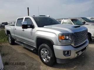 2019 GMC Sierra 3500HD Denali z VIN 1GT42WEY0KF252294, wystawiony jako Copart lot #76052204 z przebiegiem 61 881 mil mil oraz Nie do naprawy. Historia ofert i sprzedaży dostępna na DreamBid. Obrazek 4.