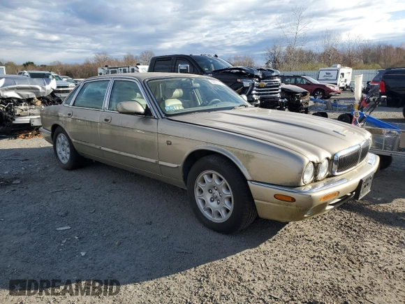 1998 Jaguar XJ with VIN SAJHX1248WC853422, listed as a Copart auction lot 80614724 with 76,269 mi miles and Non repairable. Bid and sale history available at DreamBid. Image 4.