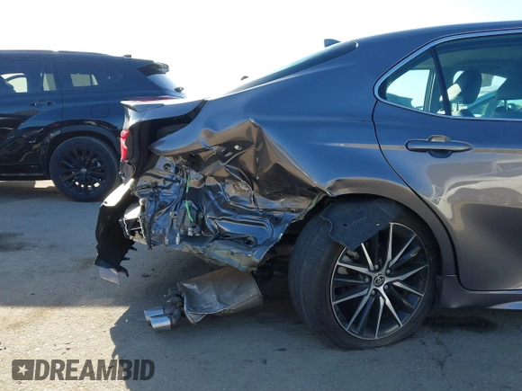 2023 Toyota Camry SE with VIN 4T1T11AK5PU778583, listed as a IAAI auction lot 41721664 with 41,145 mi miles and . Bid and sale history available at DreamBid. Image 6.