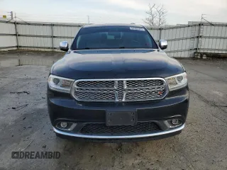 2014 Dodge Durango Citadel z VIN 1C4RDJEG8EC598108, wystawiony jako Copart lot #52485325 z przebiegiem 137 179 mil mil oraz Szkoda całkowita • Salvage title. Historia ofert i sprzedaży dostępna na DreamBid. Obrazek 5.