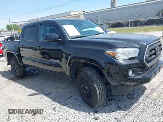 2021 Toyota Tacoma SR5 with VIN 3TMAZ5CN4MM158021, listed as a IAAI auction lot 42060889 with 37,998 mi miles and . Bid and sale history available at DreamBid. Image 1.