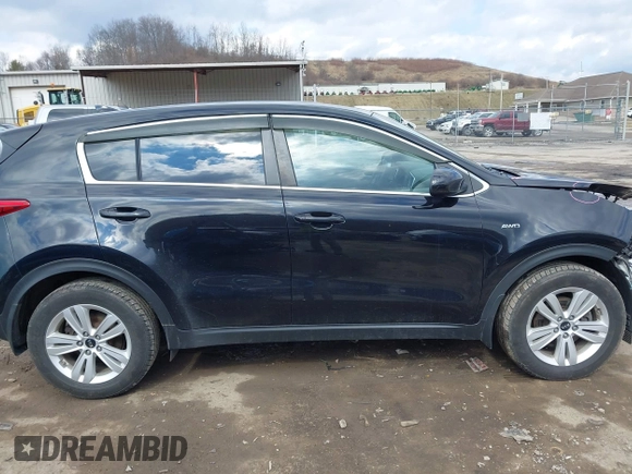 2018 Kia Sportage LX with VIN KNDPMCAC3J7380179, listed as a IAAI auction lot 41672067 with 134,390 mi miles. Bid and sale history available at carsss.com. Image 14.
