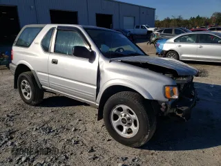 2002 Isuzu Rodeo z VIN 4S2CK57W524323426, wystawiony jako Copart lot #42191765 z przebiegiem 112 024 mil mil oraz Szkoda całkowita • Salvage title. Historia ofert i sprzedaży dostępna na DreamBid. Obrazek 4.
